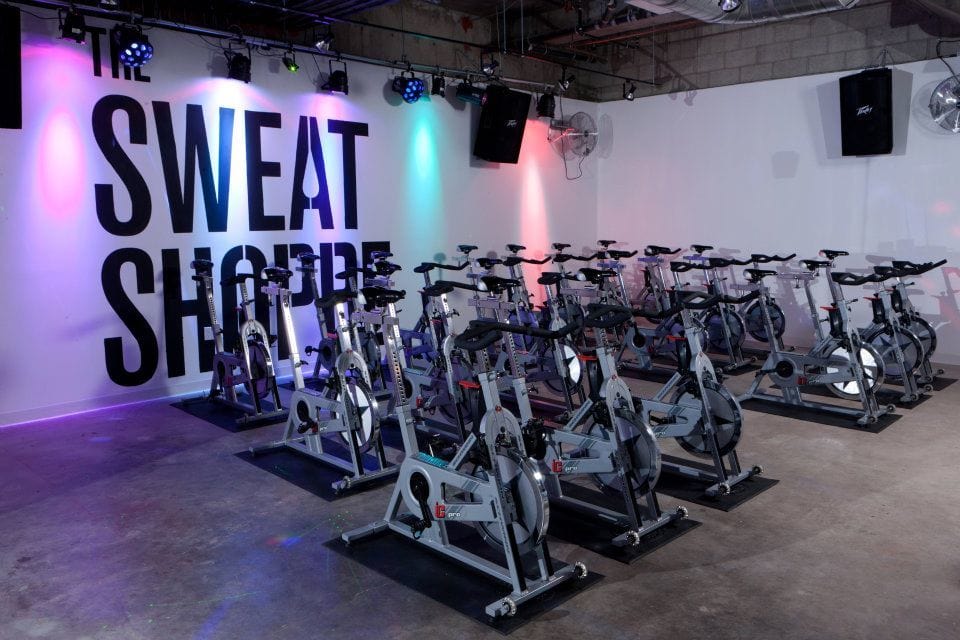 Cycling room with multicolored lights.